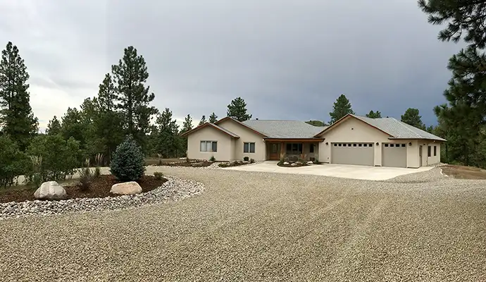 New home with gravel drivewway