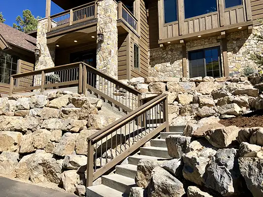 retaining wall and stairs at large home