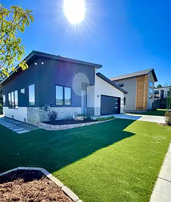 Modern home with lawn in Durango Colorado